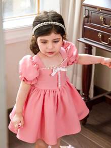 Vestido corto de verano elegante y lindo para bebé niña, con mangas con volantes y lazo rosa - Rosa - Ver 1