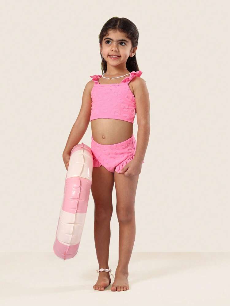 Dwuczęściowy komplet bikini z teksturowanym wzorem, falbankami i krzyżującymi się ramiączkami z tyłu