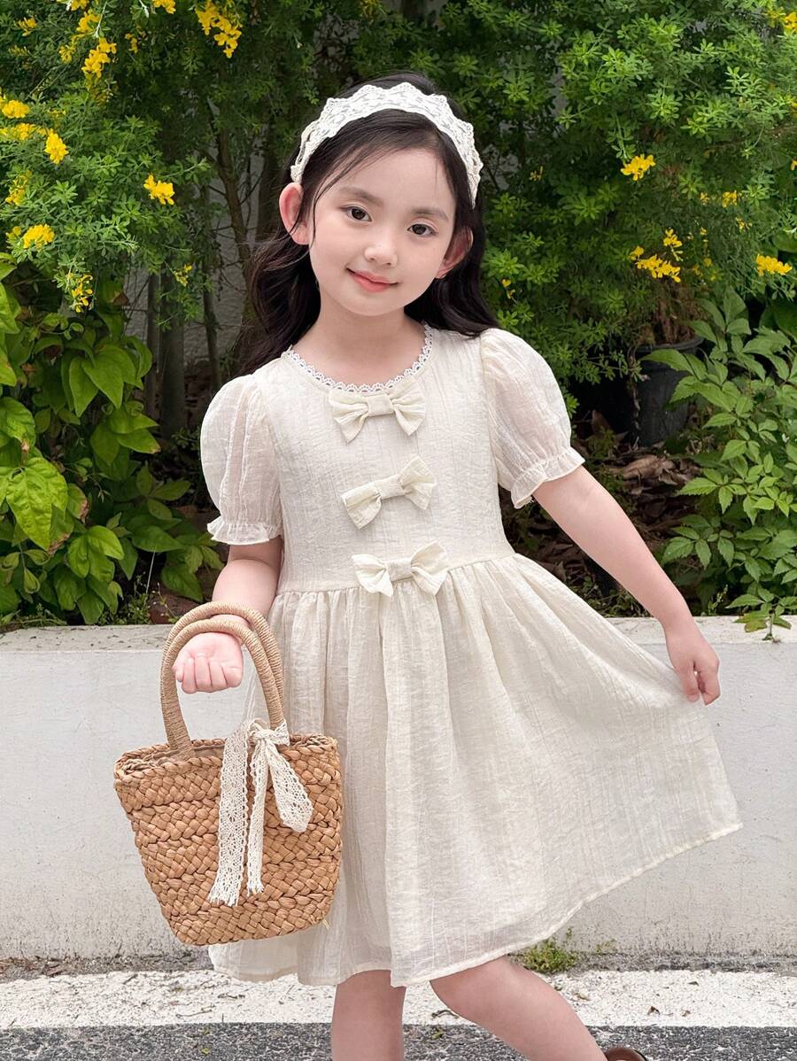 SHEIN Little Byeori 女童可爱蝴蝶结泡泡袖连衣裙 - 卡其色 - 查看 1