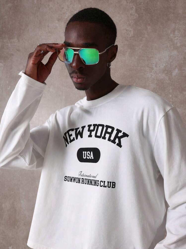 Camiseta oversize de manga comprida para esportes universitários
