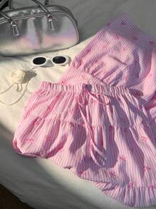 Comfortcana 2025新款女士粉色度假蝴蝶结印花可爱风格半身裙工作夏装