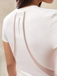 OutZeal Maglietta aderente con scollo a girocollo, in tessuto ultra morbido e traspirante, ideale per corsa, allenamento e tennis, del marchio OutZeal