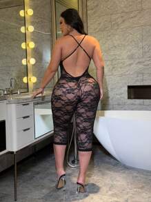 Flirla Mono sexy y ajustado de talla grande con encaje, escote halter y espalda descubierta