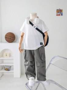2pcs Tween Boy Casual Solid Color Round Neck Short Sleeve T-Shirt And Loose Woven Cargo Pants Set, Suitable For Commuting, School, Everyday Casual, Travel, Sports, Spring, Summer, Autumn, Winter