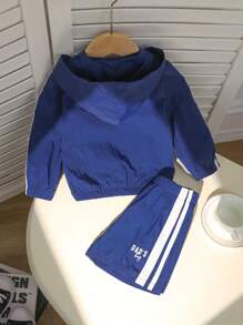 2pcs Baby Boy Outfits, Infant Long Sleeve Sporty Hooded Zip-Up Jacket And Shorts Set, Toddler Boys Casual Sports Suit. Top Is Woven Sun Protection Jacket With Elastic Cuffs And Open Front, Bottom Is Casual Sports Shorts. Tops & Shorts Have Contrast White Striped Trims, And Front Has DAD'S BOY Print. Suitable For Daily Wear, Sports, Vacation, Boy Clothes Set Brand Baby Clothes Toddler Clothes Baby Boy Summer Clothes  Baby Clothes Sets Baby Boy Sports Clothes