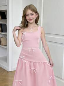 SHEIN Vestido elegante de longitud media sin mangas con decoración de lazo asimétrico para niñas preadolescentes
