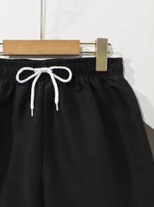 Pantaloncini da spiaggia tinta unita con vita regolabile, adatti per ragazzi adolescenti