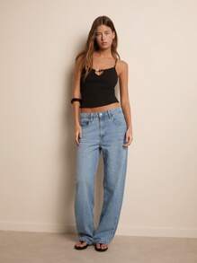 Nöista Top tipo camiseta con diseño calado, con vibras Y2K y vintage. Esencial para un estilo chic de verano, minimalista y de los 2000 - Negro - Ver 3