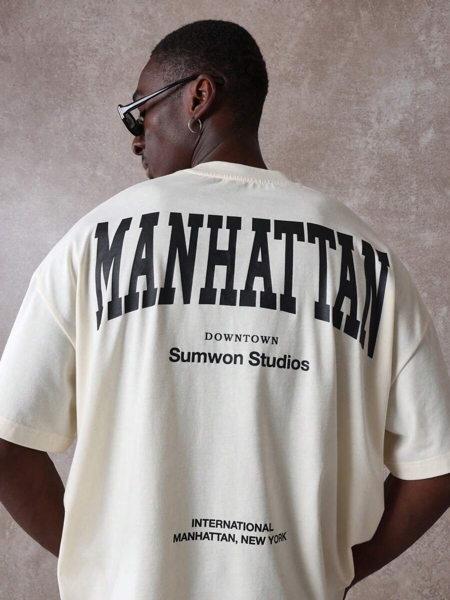 SUMWON Camiseta de corte recto de la colección internacional de Nueva York de Sumwon Studios, con el logotipo de Manhattan Downtown, estilo urbano y juvenil