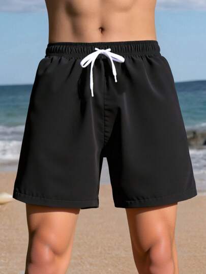 SHEIN Tonårspojke enfärgade badshorts med dragsko i midjan