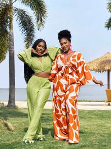 Slaydiva Elegantes romantisches Jumpsuit mit Blumenmuster und Bindedetail in Große Größen, Frühlings- und Sommerbekleidung für Frauen, formelle orangefarbene Hosen für Urlaubsoutfits von Frauen, Resort-Bekleidung