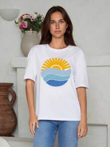 Camiseta sobredimensionada con bordado detallado de motivos naturales