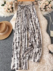 SHEIN PETITE Pantalones anchos de pierna ancha estampados, de corte holgado y casual, apropiados para vacaciones y uso diario