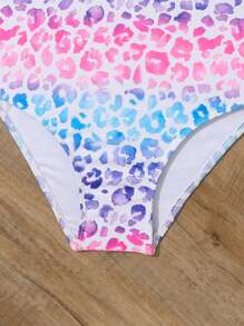 青少年女孩豹紋字母膠帶交叉一件式泳衣