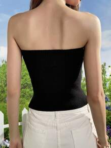 SHEIN EZwear Top corto sin mangas con dobladillo asimétrico y decoración de botones de metal, color negro