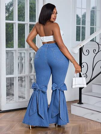 Slaydiva Pantalones vaqueros acampanados de tela elástica con decoración de lazo para mujer talla grande, pantalones vaqueros acampanados ajustados