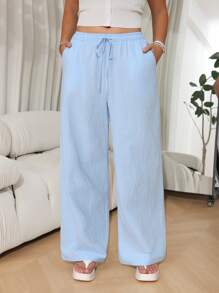 SHEIN EZwear Pantalones casuales sueltos de pernera ancha con cinturón en color liso para mujer de talla grande