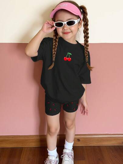 SHEIN Conjunto de 2 piezas de top de manga corta y shorts de estilo sencillo para niña, adecuado para el verano