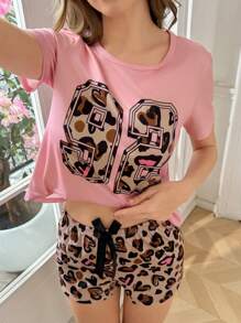 SHEIN Nuevo conjunto informal de primavera/verano de 2 piezas para jóvenes - Pijama de camiseta de manga corta de punto con estampado de leopardo rosa y shorts