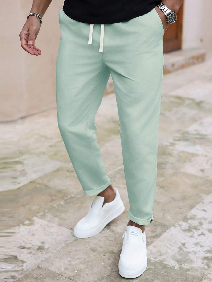 Manfinity Homme Pantalones casuales de unicolor, ajuste delgado, pierna recta para hombres, pantalones de verano, otoño - verde menta - Ver 1