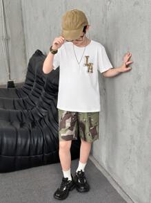 SHEIN 2pcs/Set Tween Boys Loose White Short Sleeve T-Shirt With Letter Print And Relaxed Camouflage Print Cargo Pants With Pouch Bag