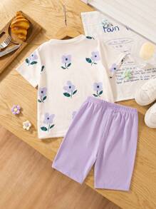 SHEIN Conjunto de Ramadán de 2 piezas para niñas con camiseta de manga corta de cuello redondo con estampado floral y pantalones ajustados a rayas, atuendo casual y dulce de verano