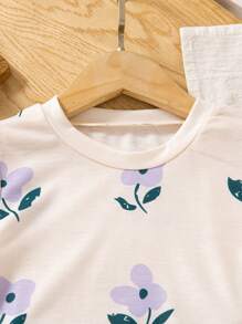 SHEIN Conjunto de Ramadán de 2 piezas para niñas con camiseta de manga corta de cuello redondo con estampado floral y pantalones ajustados a rayas, atuendo casual y dulce de verano