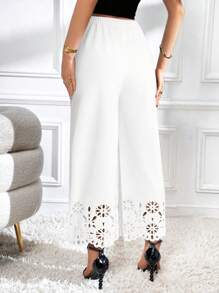 Firerie Pantalones de pierna ancha con cintura elástica y corte láser de unicolor para mujeres