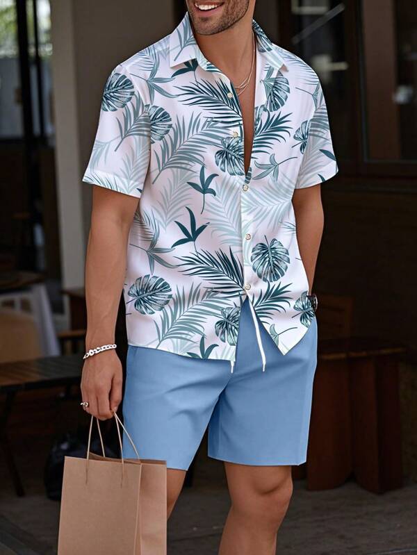 Manfinity RSRT Conjunto de camisa de manga corta con estampado floral hawaiano y pantalones cortos de unicolor para hombres