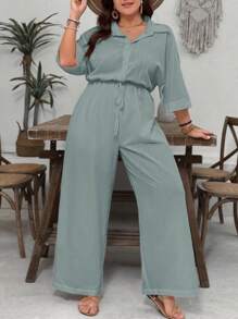 SHEIN VCAY Plus Size Island Vacation White Textured Fabric Collared Short Sleeve Cinched Waist Wide Leg Jumpsuit, Casual Versatile Loose Fit