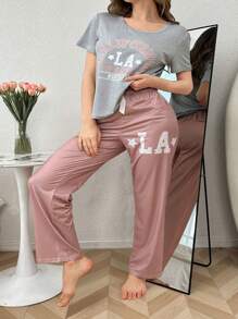 SHEIN Set de 2 piezas de pijama de mujer con top de cuello redondo de manga corta con estampado de letras y pantalón largo, de estilo casual