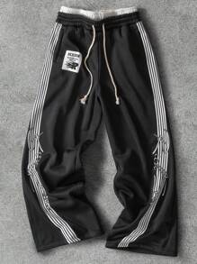 Manfinity EMRG 男士印花抽绳腰休闲裤，适合夏季街头服饰