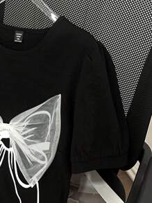 Flirla Plus Size Women's Bowknot Print Elegant Round Neck T-Shirt,Suitable For Commuting - Black - View 4