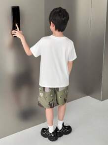 SHEIN 2pcs/Set Tween Boys Loose White Short Sleeve T-Shirt With Letter Print And Relaxed Camouflage Print Cargo Pants With Pouch Bag