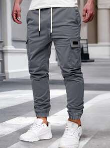 Manfinity Homme Pantalones cargo casuales de color liso y minimalistas con cordones para hombres