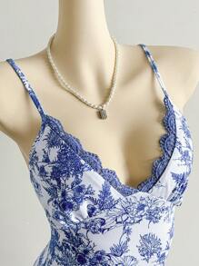 Soleia 女式度假不对称下摆无袖蓝色印花雪纺连衣裙