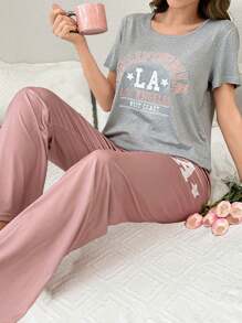SHEIN Set de 2 piezas de pijama de mujer con top de cuello redondo de manga corta con estampado de letras y pantalón largo, de estilo casual