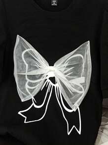 Flirla Plus Size Women's Bowknot Print Elegant Round Neck T-Shirt,Suitable For Commuting - Black - View 6