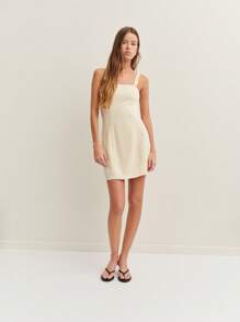 Nöista Beige High Neck A-Line Mini Dress
Classy Beige A-Line Mini Dress With High Neck Design, Perfect For Wedding Guest Attire, Formal Brunches, Or Sophisticated Spring Looks. - Apricot - View 4