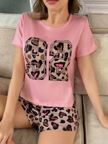 SHEIN Nuevo conjunto informal de primavera/verano de 2 piezas para jóvenes - Pijama de camiseta de manga corta de punto con estampado de leopardo rosa y shorts