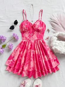 Soleia Combinaison évasée à deux couches avec taille resserrée, décolleté en V, volants sur le buste et imprimé floral rouge. Convient pour les fêtes, Noël, les rendez-vous, la Saint-Valentin, le thé de l'après-midi, les mariages