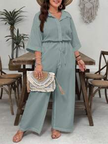 SHEIN VCAY Plus Size Island Vacation White Textured Fabric Collared Short Sleeve Cinched Waist Wide Leg Jumpsuit, Casual Versatile Loose Fit