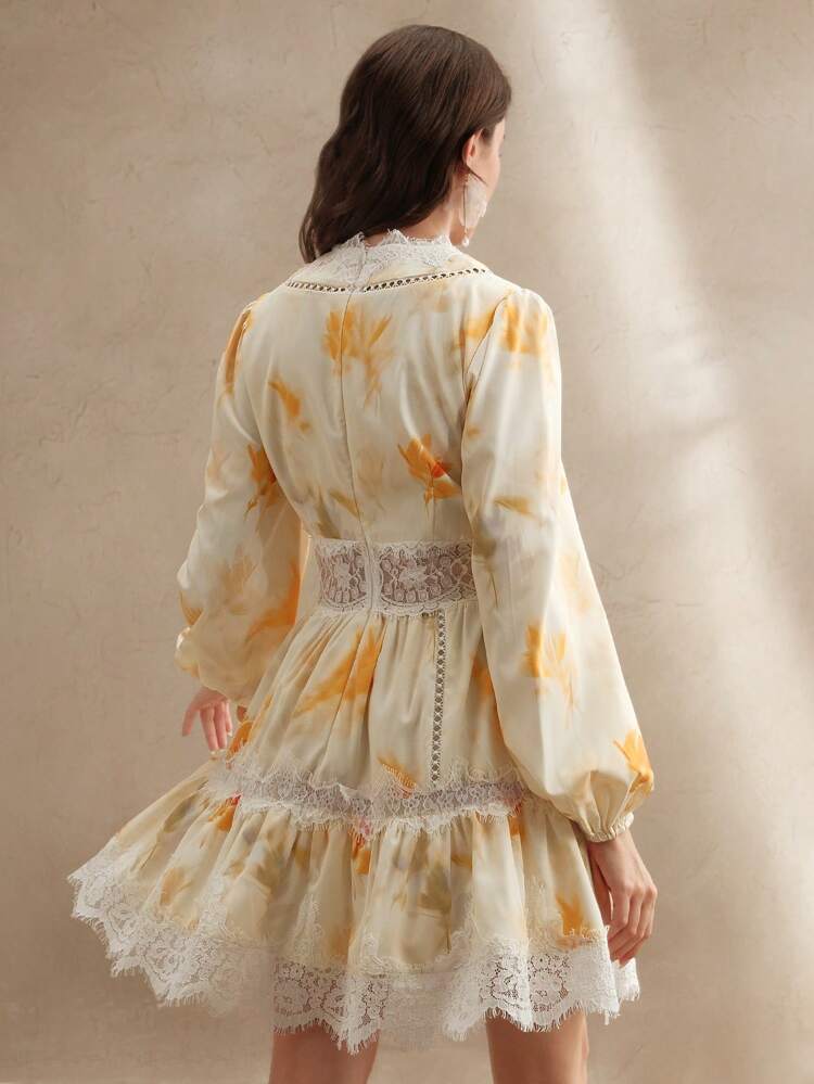Robe nouvelle mode pour femmes avec col en V, taille marquée, empiècement en dentelle, imprimé et manchettes élastiques