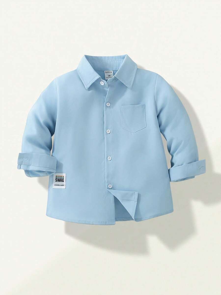 SHEIN Explorewe 年轻男孩休闲纯色长袖衬衫，带装饰性小徽章，适合日常休闲装、旅行、聚会和上学，适合春秋季节 - 藍色 - 查看 1