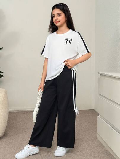 SHEIN 青少年女孩休闲复古学院风宽松超大落肩撞色领带蝴蝶结印花圆领 T 恤和直筒运动裤针织套装，黑白