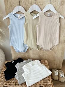 SHEIN Vintaside Kids 男宝宝夏季多色无袖连体衣六件套，涵盖黑、白、灰、深杏、浅蓝、浅卡其等经典色系，多种颜色满足多种搭配需求，风格简约休闲舒适大气。采用坑纹面料，具有天然纹理 - 彩色 - 查看 7