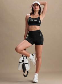SHEIN Sports Conjunto de activewear con camiseta de tirantes y shorts con estampado de letra para mujer