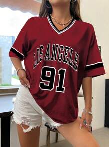 Flirla T-shirt oversize a scollo a V con grafica leopardata, numerico in inglese e scritta "Los Angeles", taglie forti
