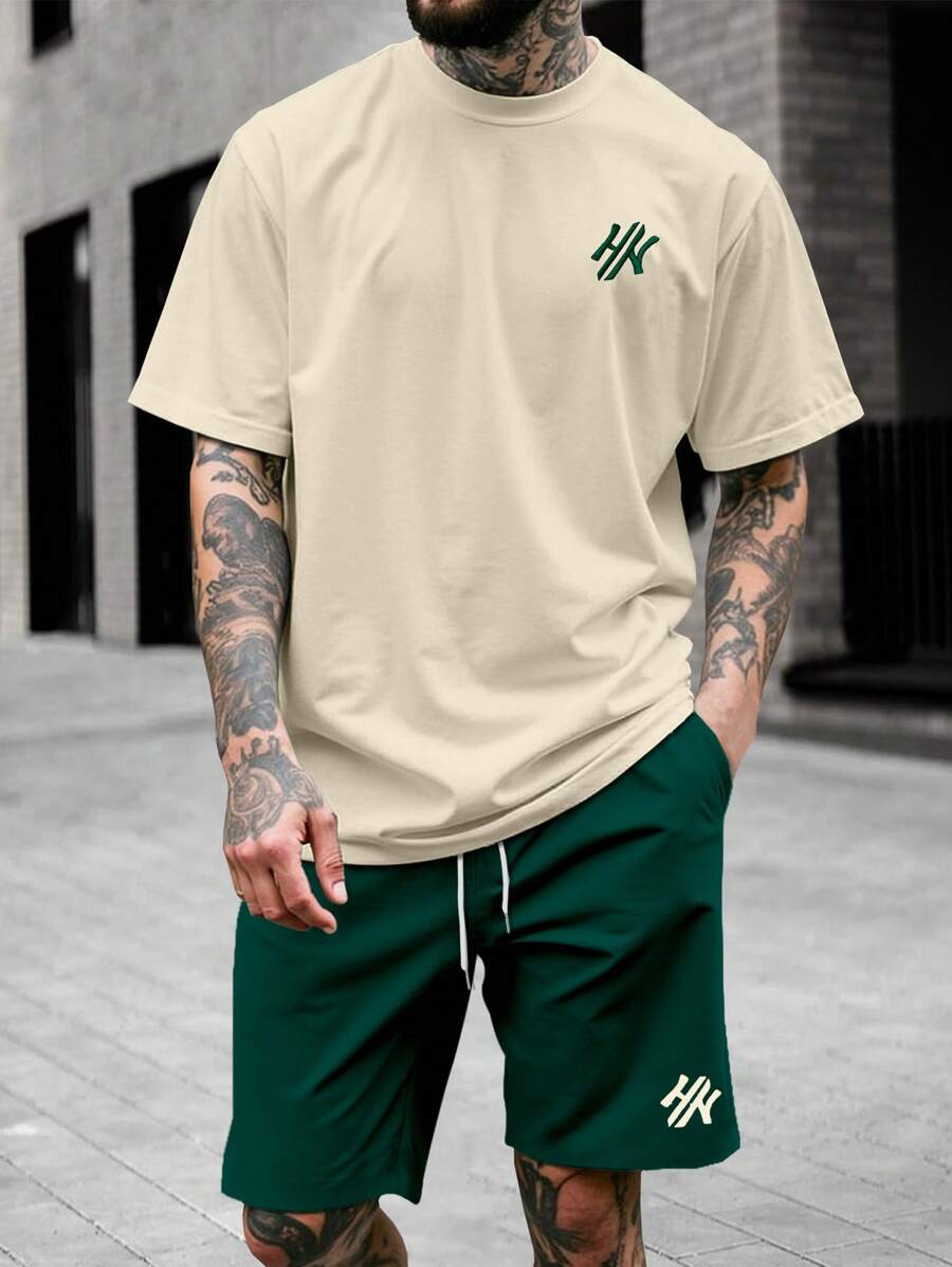 Manfinity Homme 2 pièces/set T-shirt à col rond à manches courtes avec imprimé lettre et short à cordon de serrage pour hommes. Ensemble de 2 pièces pour l'été. Tenues d'été pour hommes. Tenues de plein air. Cadeaux pour mari et petit ami, pour les amis - Multicolore - Voir 1