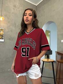 Flirla T-shirt oversize a scollo a V con grafica leopardata, numerico in inglese e scritta "Los Angeles", taglie forti